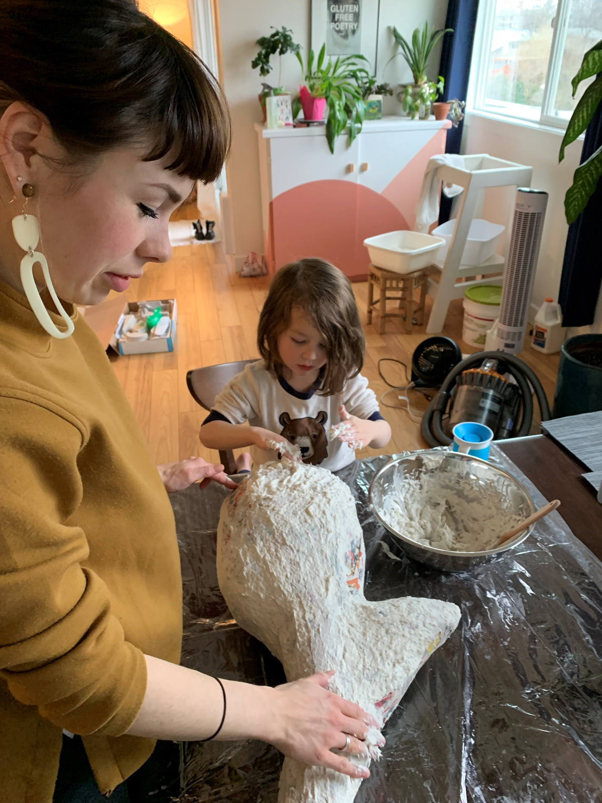 Kelsie Balehowsky creating Sensorineural art installation with son Elliot
